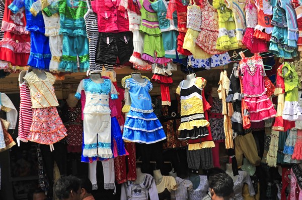 Market stall with a selection of colourful children's clothes, different designs, Varanasi, Uttar Pradesh, India, Asia