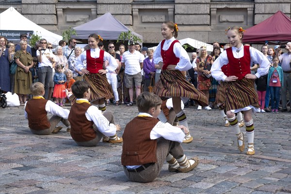 Riga. Ligo Festival. Folk dance groups on the city square, Riga, Latvia, Europe