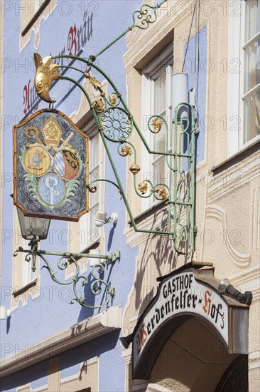 Old, decorated hanging sign of the Werdenfelser Hof inn in Ludwigstrasse, Partenkirchen district, Garmisch-Partenkirchen, Werdenfelser Land, Upper Bavaria, Bavaria, Germany, Europe