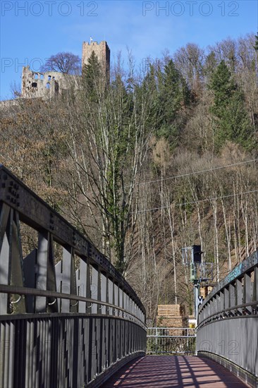 Bridge over the Elz river and the ruins of Kastelburg castle with winter trees in Waldkirch, Emmendingen district, Baden-Wuerttemberg, Germany, Europe