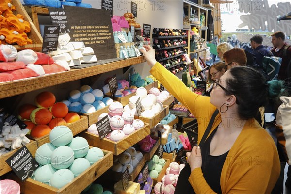 Customers in a LUSH cosmetics shop. The so-called Naked Shop offers 240 sustainable alternatives to packaged cosmetics, Berlin, 05 October 2018