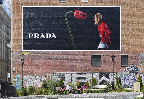 Hand-painted mural, woman with handbag standing in front of flower, advert for PRADA, SoHo district, Manhattan, New York City, New York, USA, North America