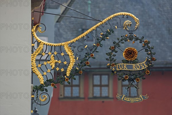 Nose sign of the restaurant Zur Rose, rose figure, inscription, lden, main street, Ochsenfurt, Lower Franconia, Franconia, Bavaria, Germany, Europe