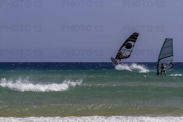 Surfer at Playa de Sotavento, Costa Calma, Fuerteventura, Canary Island, Spain, Europe