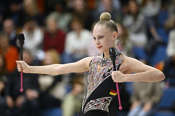 Alina Ott (GER), action, clubs, rhythmic gymnastics, RSG, Schmiden International 2024, Fellbach, Baden-Wuerttemberg, Germany, Europe