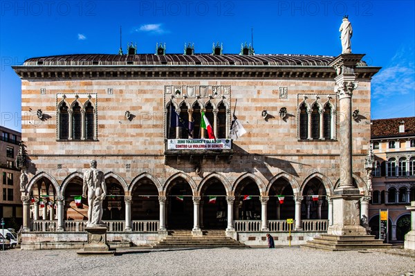 White and pink striped Loggia del Lionello in the finest Venetian Gothic style, 15th century in Piazza della Liberta, Udine, most important historical city in Friuli, Italy, Udine, Friuli, Italy, Europe