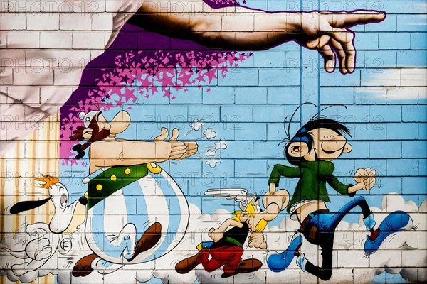 Painted house wall with comic figures, Asterix and Obelix, graffiti, Porte de Clignancourt, Paris, France, Europe
