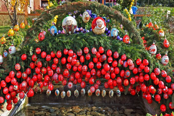 Detail of an Easter fountain in Franconian Switzerland, Bamberg district, Upper Franconia, Germany, many colourful blown-out and dyed eggs as decoration, Easter custom, Europe