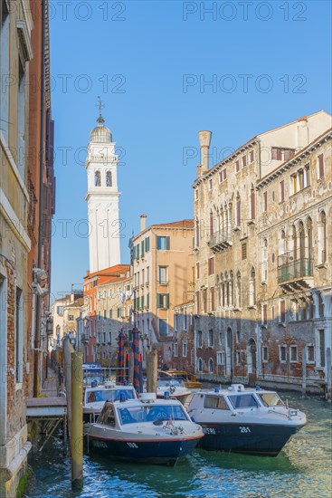 Police Station with Police Motorboat on Water Canal in a Sunny Day in City of Venice, Veneto, Italy, Europe