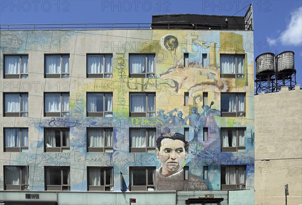 Mural, graffiti man musician and wolf, on residential building, SoHo neighbourhood, Manhattan, New York City, New York, USA, North America