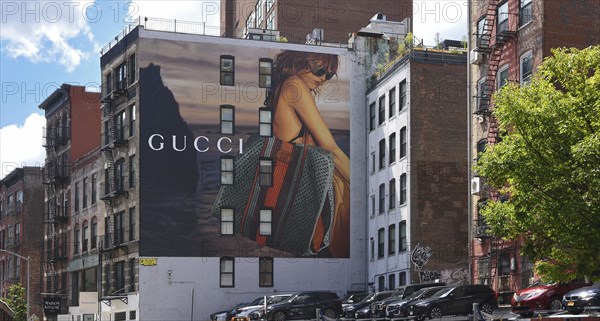 Hand-painted mural, woman with bag, advert for GUCCI, SoHo district, Manhattan, New York City, New York, USA, North America