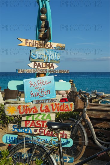 Signs in a cafe on the beach in German, Cala Rajada, Majorca, Majorca, Balearic Islands, Spain, Europe