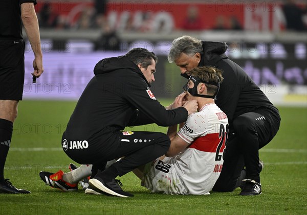 Anthony Rouault VfB Stuttgart (29) injured, broken jaw, MHPArena, club doctor Dr Dr Heiko Striegel VfB Stuttgart, supervisor Gerhard Woern, MHP Arena Stuttgart, Baden-Wuerttemberg, Germany, Europe