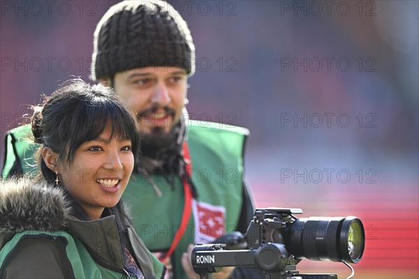 Stadium TV, camerawoman, cameraman, Sony camera on Ronin Rig, logo, Voith Arena, Heidenheim, Baden-Wuerttemberg, Germany, Europe