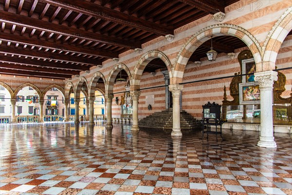 White and pink striped Loggia del Lionello in the finest Venetian Gothic style, 15th century in Piazza della Liberta, Udine, most important historical city in Friuli, Italy, Udine, Friuli, Italy, Europe