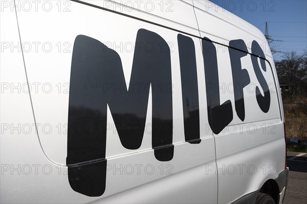 On Milf's modified lettering on a van of the car sharing provider Miles, Duesseldorf, Germany, Europe