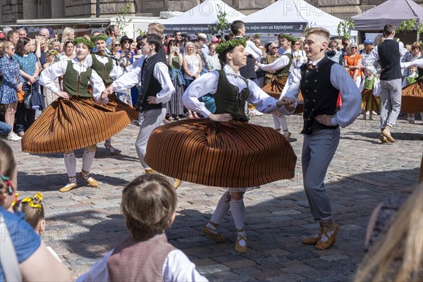 Riga. Ligo Festival. Folk dance groups on the city square, Riga, Latvia, Europe