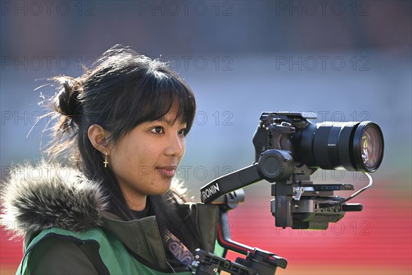 Stadium TV, camerawoman, Sony camera on Ronin rig, logo, Voith-Arena, Heidenheim, Baden-Wuerttemberg, Germany, Europe