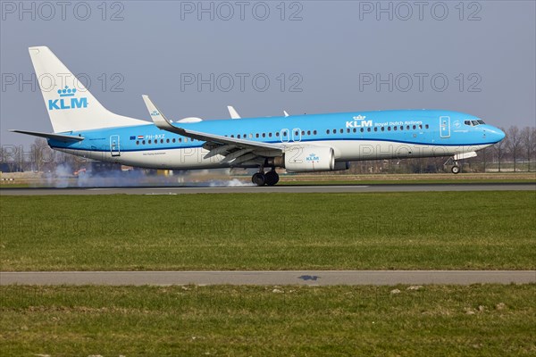 KLM Boeing 737-8K2 with registration PH-BXZ lands on the Polderbaan, Amsterdam Schiphol Airport in Vijfhuizen, municipality of Haarlemmermeer, Noord-Holland, Netherlands