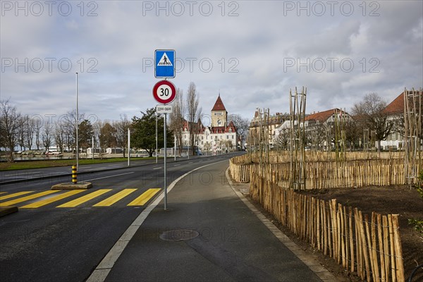 Quai de Belgique with zebra crossing and view towards Ouchy Castle in the Ouchy district, Lausanne, district of Lausanne, Vaud, Switzerland, Europe