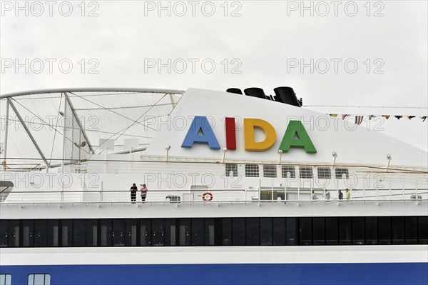 AIDAluna, cruise ship, year of construction 2009, 251, 89m long, part of an AIDA cruise ship with coloured logo and people, Hamburg, Hanseatic City of Hamburg, Germany, Europe