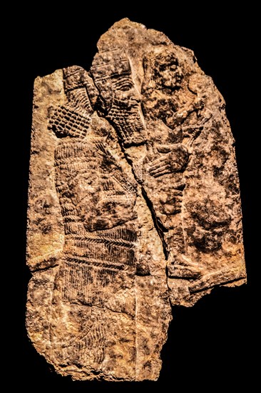 Assyrian soldier removing a statue of a god from a temple in an enemy city, Ninieveh, South-West Palace, 704-681 b.C., Archaeological Museum, Castello di Udine, Udine, most important historical city of Friuli, Italy, Udine, Friuli, Italy, Europe