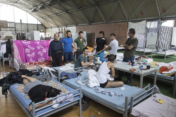 Refugees from Syria are housed in a gymnasium at the central contact point for asylum seekers in Brandenburg, 03/06/2015