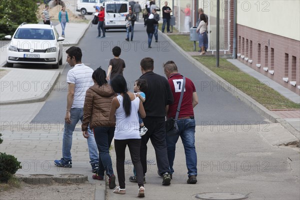 Refugees at the central contact point for asylum seekers in the state of Brandenburg in Eisenhuettenstadt, 03.06.201.5