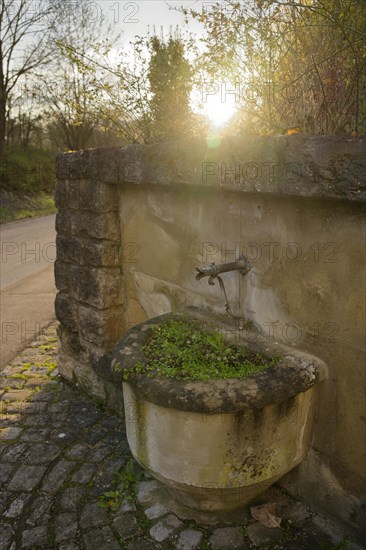 fountain at the village church, Gottwollshausen, church, spring, schwaebisch hall, hohenlohe, heilbronn-franken, baden-wuerttemberg, germany