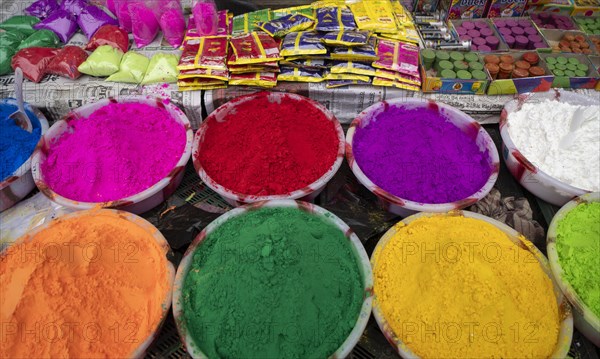 Vendor sells Holi celebration items in a street market, ahead of Holi festival on March 23, 2024 in Guwahati, Assam, India. Holi is the Hindu festival of colours, it is celebrated with great joy in India