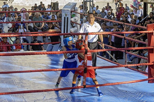 Oaxaca, Mexico, Youth boxing match in the zocalo, Central America