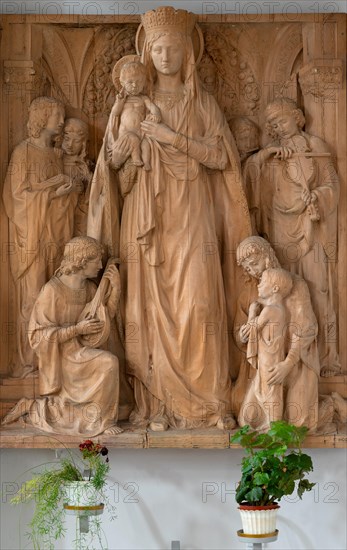 Mainkofen, Lower Bavaria, Germany, March 15th 2024, wood carving of Franz Hoser (1874-1957) in the Dreifaltigkeitskirche in Mainkofen, Virgin Mary with the Child, Europe