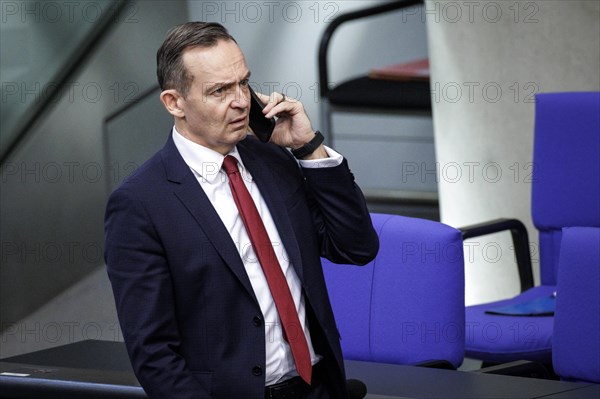 Volker Wissing, Federal Minister of Transport and Digital Affairs, on the phone shortly in front of the start of a session in the German Bundestag. Berlin, 20.03.2024