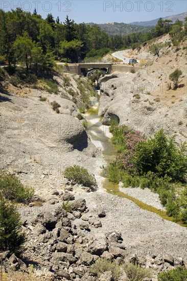 River vertical erosion through conglomerate rock beds, Rhodes, Greece, Europe