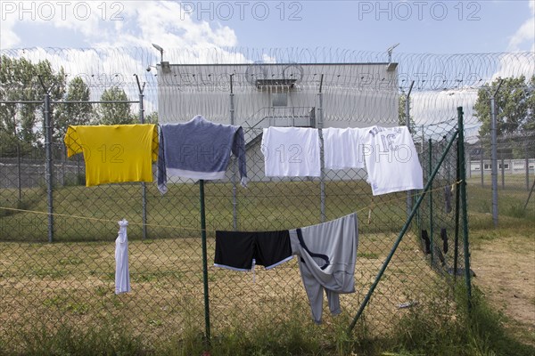 Laundry hanging to dry on a washing line in the central contact point for asylum seekers in the state of Brandenburg in Eisenhuettenstadt, 03/06/2015