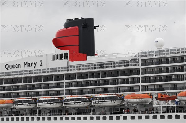Partial view of a cruise ship Queen Mary 2, with selective colour display and lifeboats, Hamburg, Hanseatic City of Hamburg, Germany, Europe