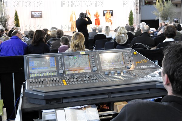 RETRO CLASSICS 2010, Stuttgart Messe, sound engineer working on a digital mixing console during an event, Stuttgart Messe, Stuttgart, Baden-Wuerttemberg, Germany, Europe