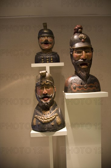 Display of old open mouthed gaper heads traditionally used to identify a pharmacy in Holland, Zuiderzee museum, Enkhuizen, Netherlands