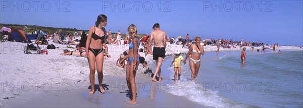 Bathing on the beach in Dueodde, popular tourist destination on the island of Bornholm, Denmark, Baltic Sea, Scandinavia. Scanned slide, Europe