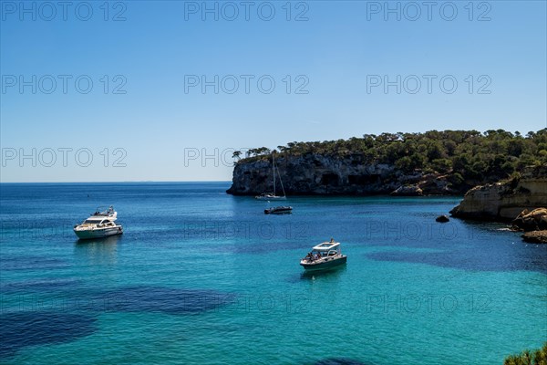 Private boats anchored in the bay in front of Playa El Mago, Cala de Portals Vells, Majorca, Balearic Islands, Spain, Europe