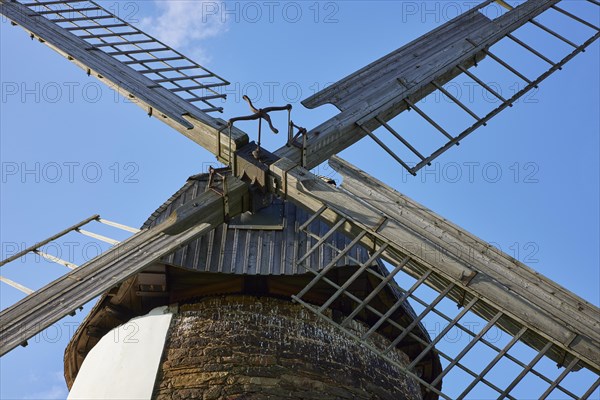 Wings of the Eickhorst windmill under a blue sky in Hille, Muehlenkreis Minden-Luebbecke, North Rhine-Westphalia, Germany, Europe