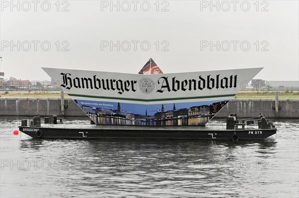 Ship with a large advertising banner of the Hamburger Abendblatt on a river, Hamburg, Hanseatic City of Hamburg, Germany, Europe