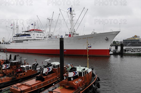 The museum ship 'Cap San Diego' parked in the cloudy harbour under an overcast sky, Hamburg, Hanseatic City of Hamburg, Germany, Europe