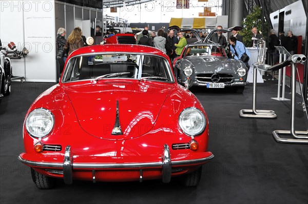 RETRO CLASSICS 2010, Stuttgart Messe, Stuttgart, Baden-Wuerttemberg, Germany, Europe, Porsche, Red classic car at a classic car exhibition surrounded by people, Europe