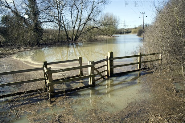 Field flooded by Belstead Brook overflow, Ipswich, Suffolk, England, UK