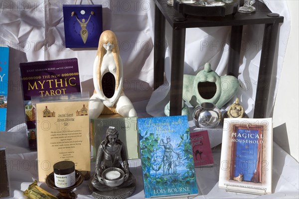 Products on display in shop window of new age mystical shop, Ipswich, Suffolk, England, an example of a specialist shop