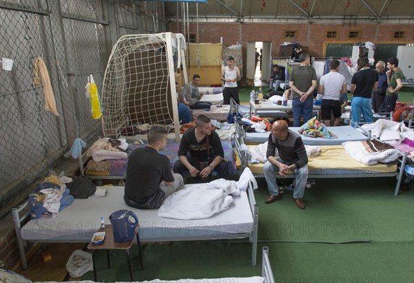 Refugees from Syria are housed in a gymnasium at the central contact point for asylum seekers in Brandenburg, 03/06/2015