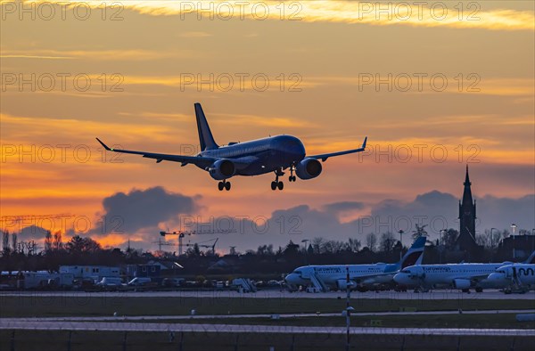 Evening sky with sunset at the airport, aeroplane landing, Stuttgart, Baden-Wuerttemberg, Germany, Europe