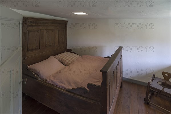 Bedroom of the married couple in a historic farmhouse from the 19th century, Open-Air Museum of Folklore Schwerin-Muess, Mecklenburg-Western Pomerania, Germany, Europe