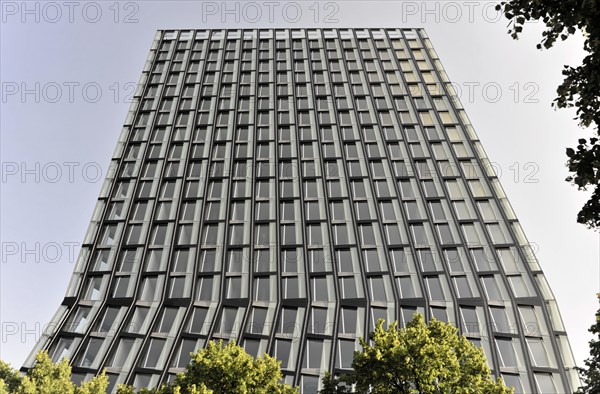 TANZENDE TUeRME, hotel and office building, completed in 2012, modern high-rise building with glass facade surrounded by green trees, Hamburg, Hanseatic City of Hamburg, Germany, Europe